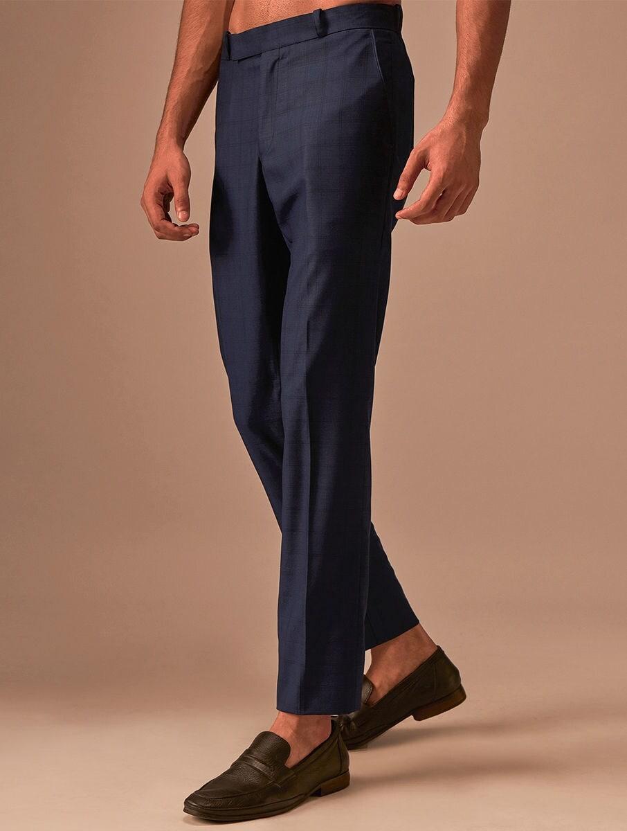men blue cotton self design full length tailored fit pants
