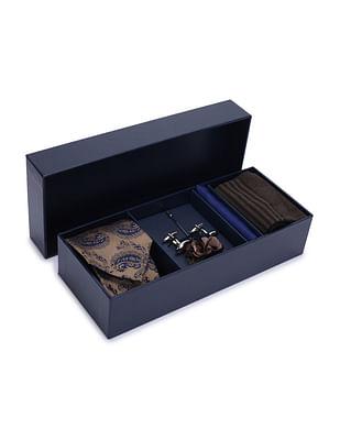 men brown and navy paisley patterned weave tie, pocket square and cufflinks set
