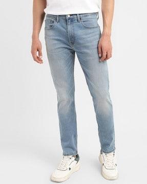 men heavily washed 512 slim tapered fit jeans