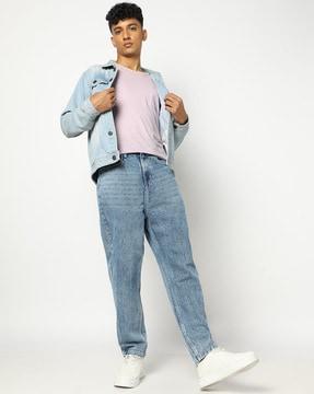 men heavily washed relaxed fit jeans