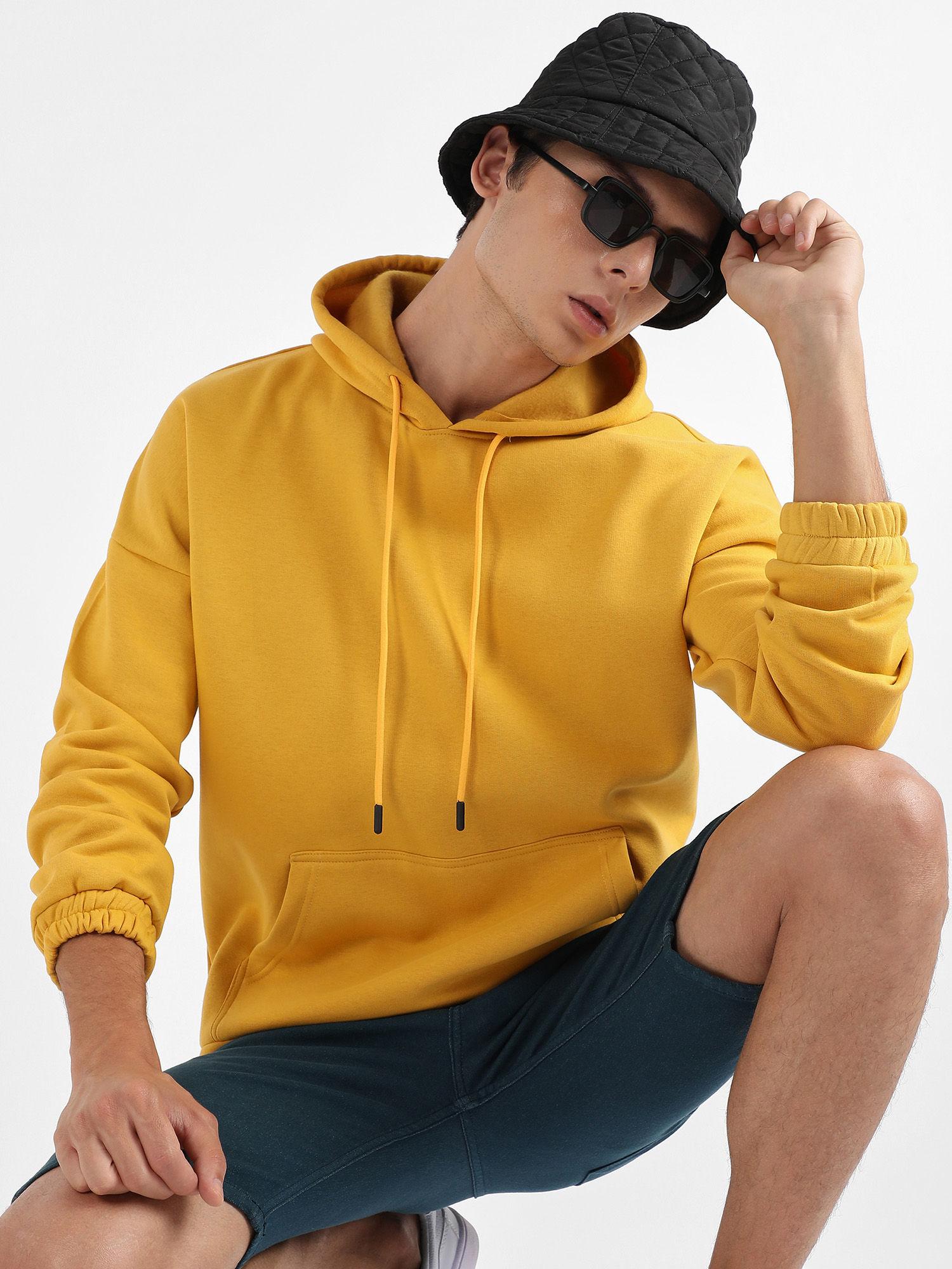 men mustard yellow oversized pullover sweatshirt with kangaroo pocket