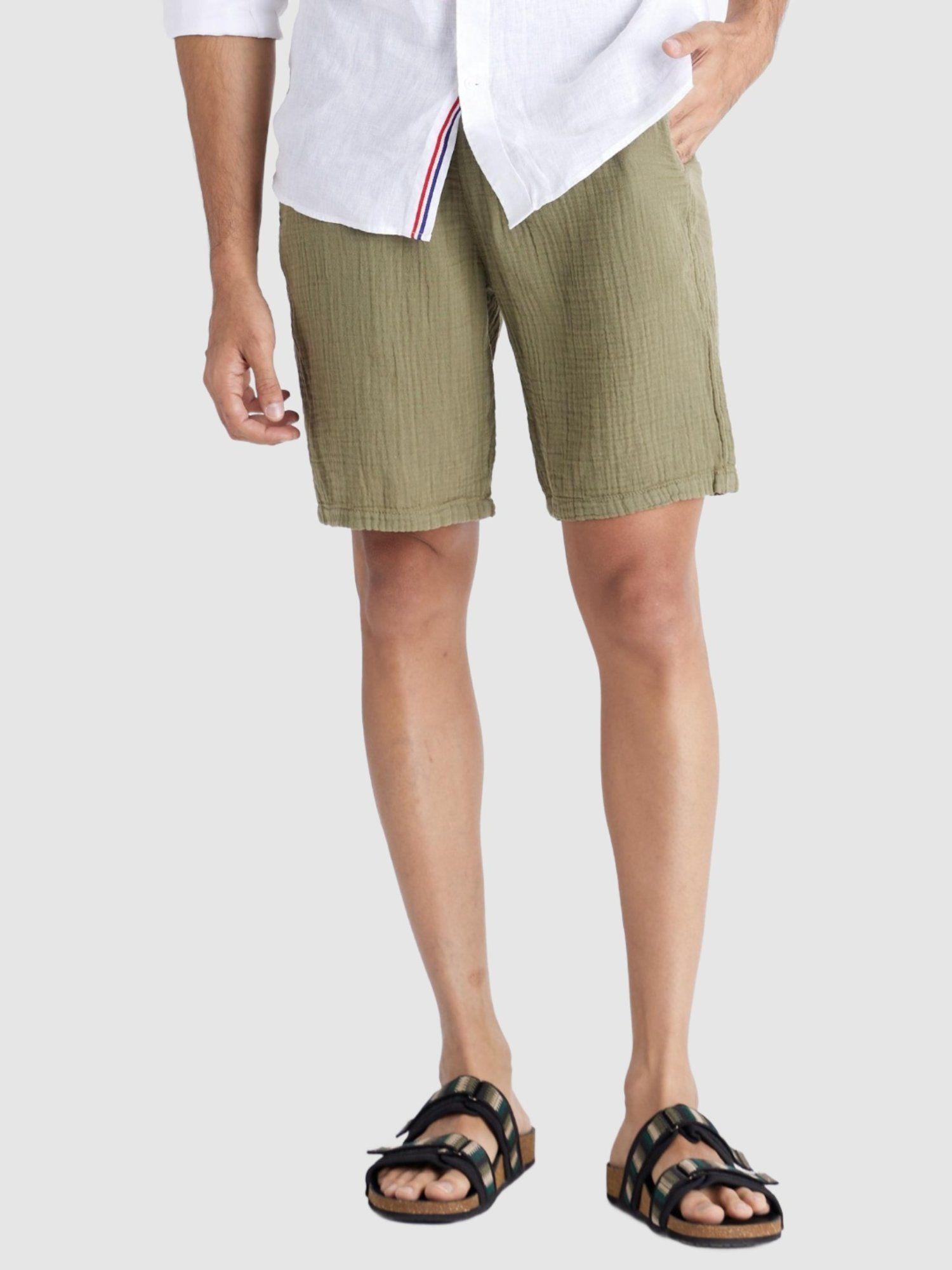men solid olive shorts