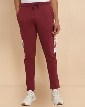men striped straight track pants with insert pockets