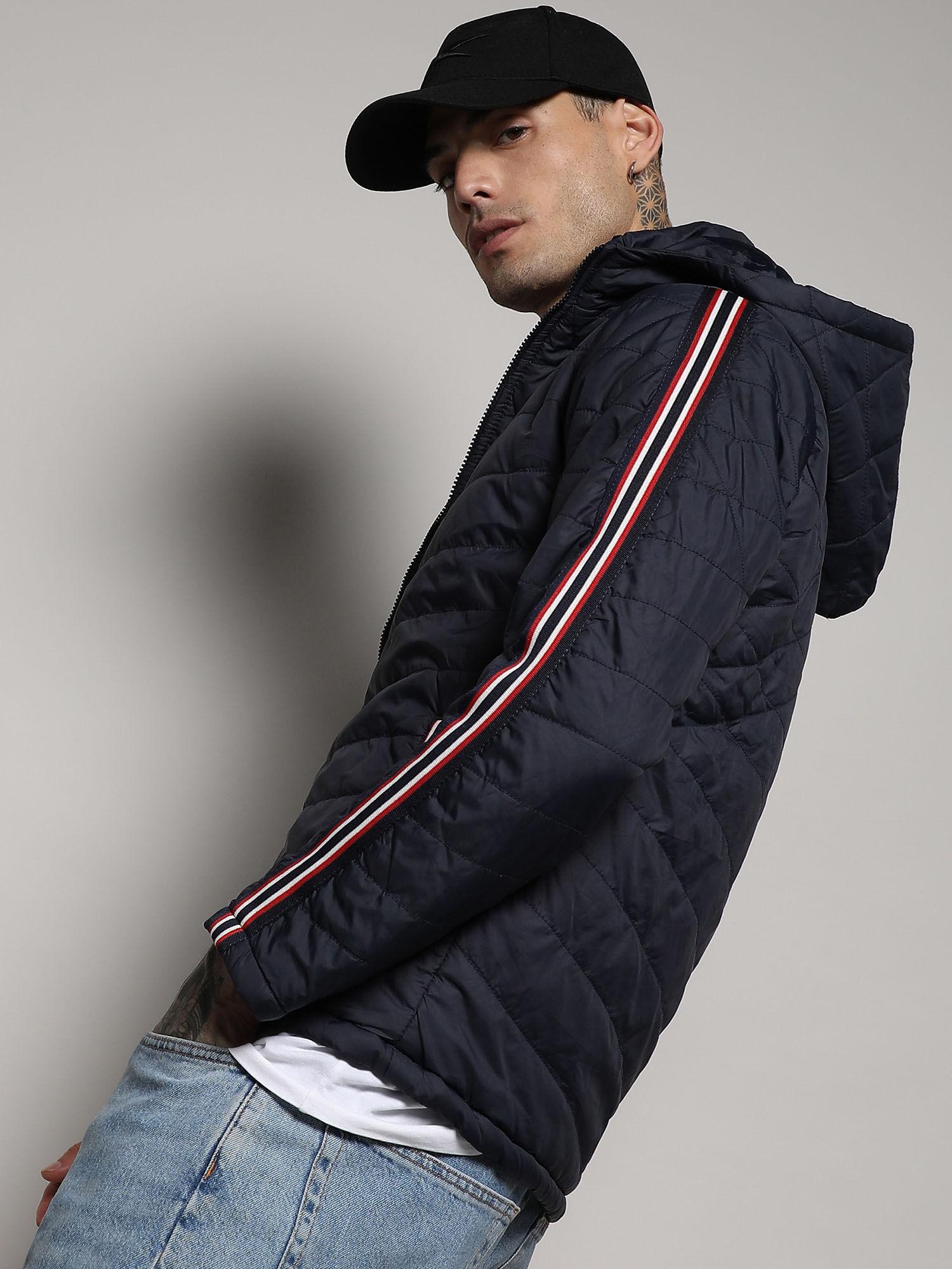 men's navy blue quilted puffer jacket with contrast striped sleeve