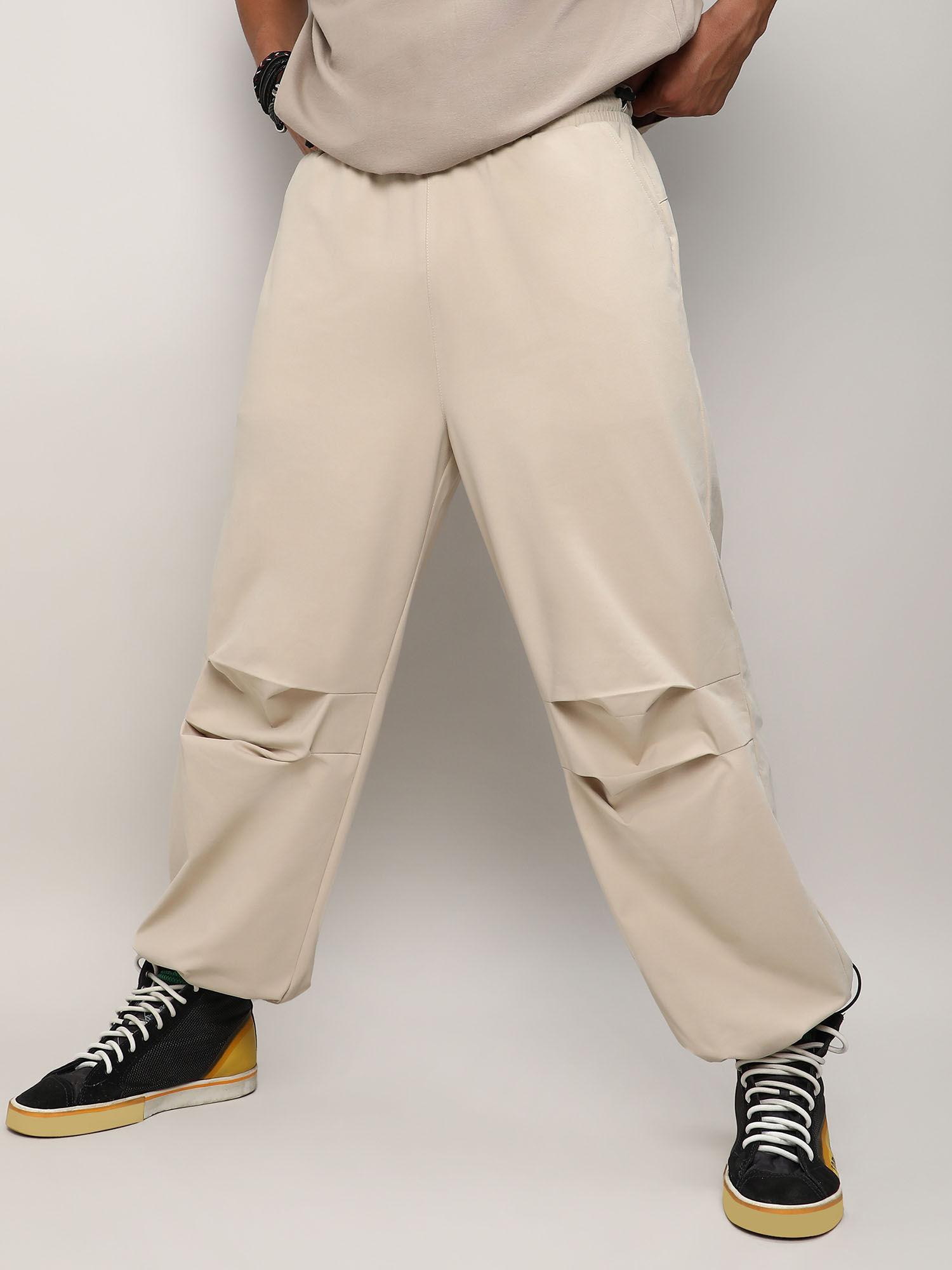 men's off-white solid parachute trousers