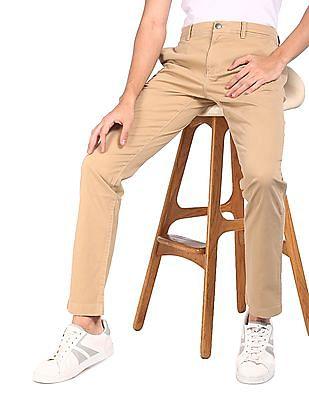 men beige mid rise solid pants