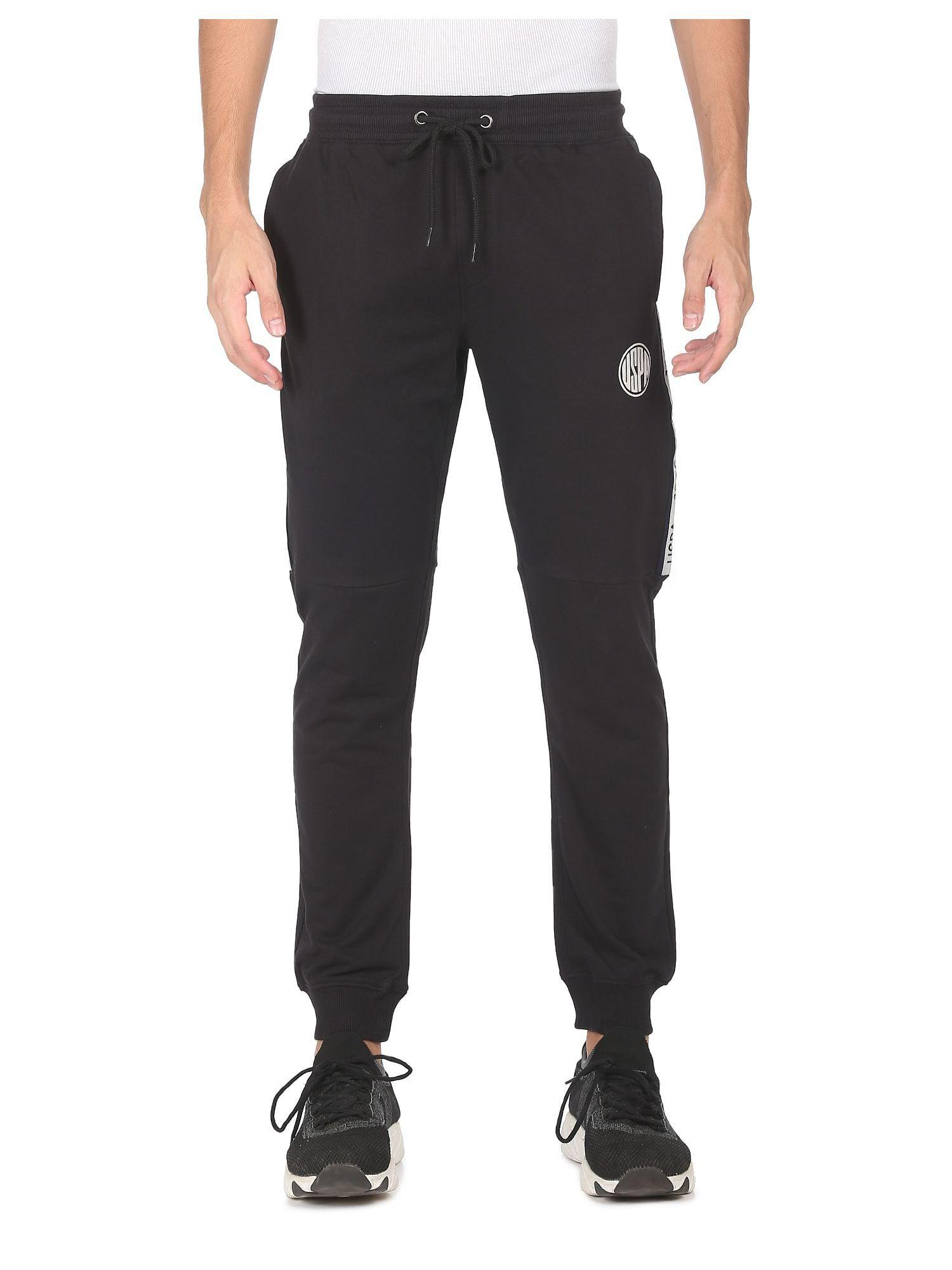 men black elasticized waist brand tape joggers