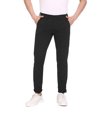 men black mid rise solid casual trousers