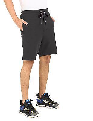 men black mid rise solid shorts