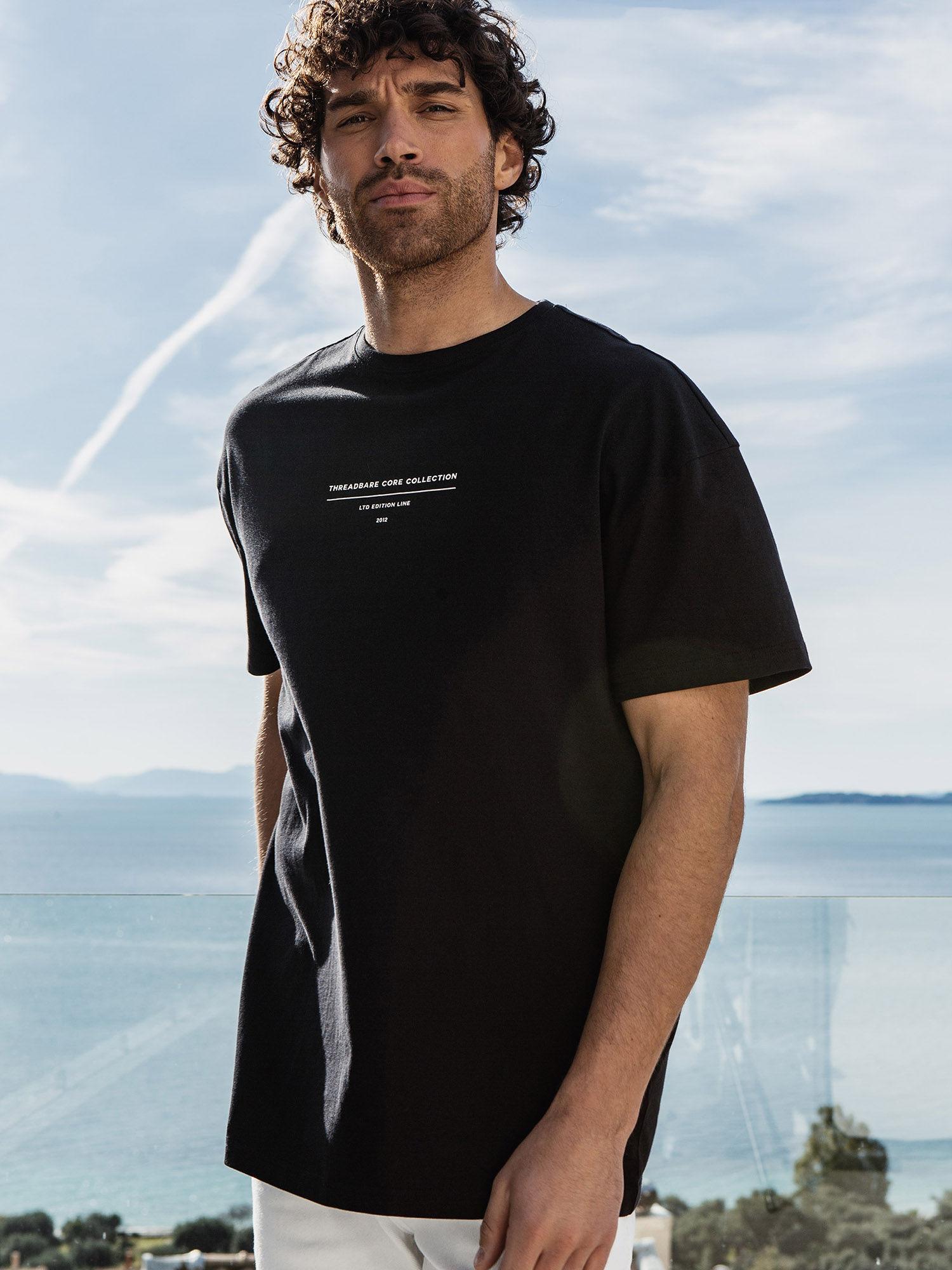 men black spinning logo oversized tee