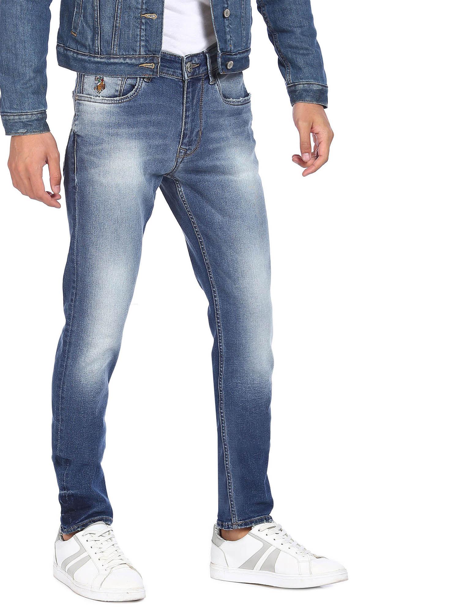 men blue mid rise slim tapered fit jeans