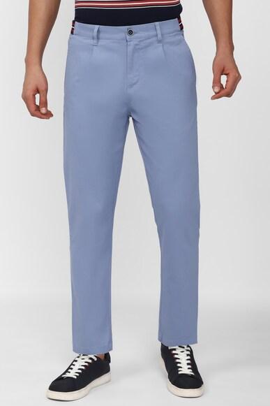 men blue solid carrot fit casual trousers