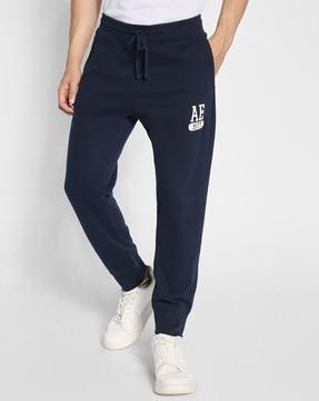 men brand print joggers