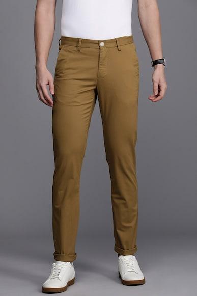 men brown slim fit solid casual trousers