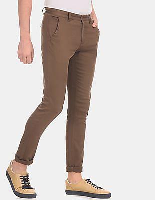 men brown solid cotton stretch mid waist casual trousers