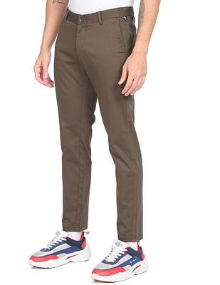 men brown super slim fit solid casual trousers