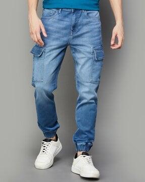 men clean washed relaxed jeans