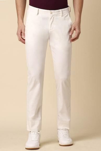 men cream slim fit solid casual trousers