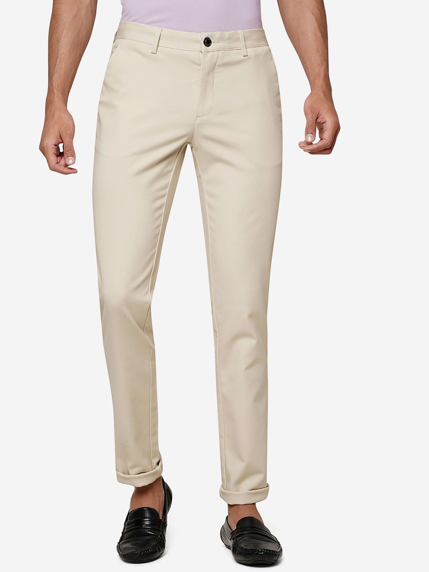 men cream solid slim fit casual trouser