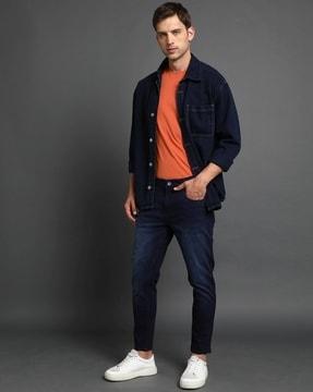 men cropped fit mid-wash jeans