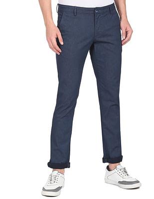 men dark blue low rise bronson slim fit casual trousers