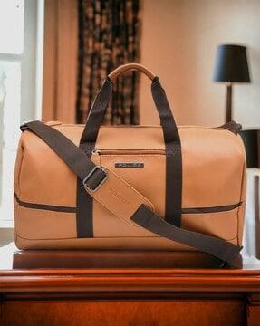 men duffle bag with metal accent