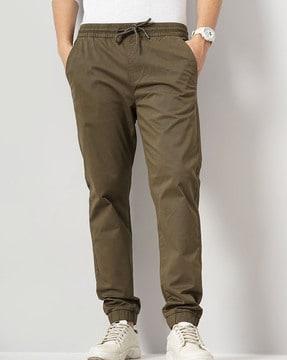 men elasticated waist joggers with insert pockets