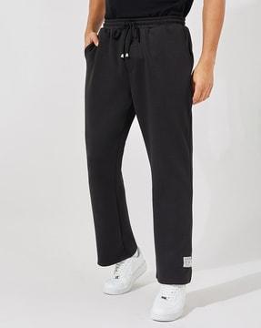 men elasticated waist joggers with insert pockets