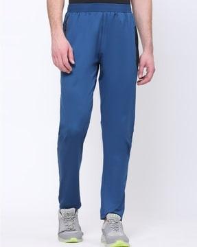 men fitted track pants with zip pockets