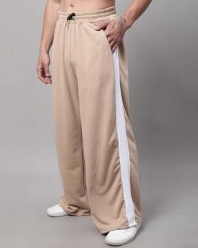 men flared track pants with contrast panel