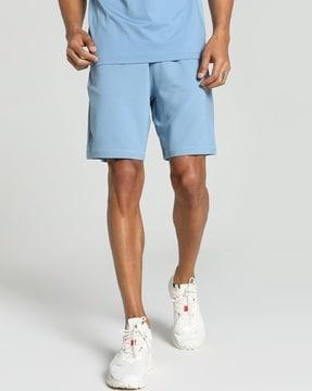 men flat-front shorts with elasticated waist
