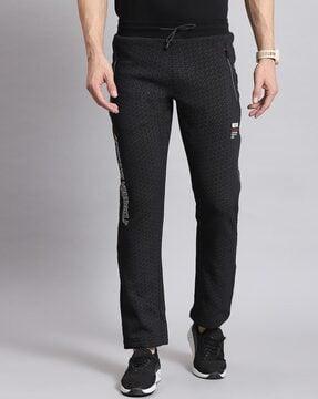 men geometric print track pants with insert pockets