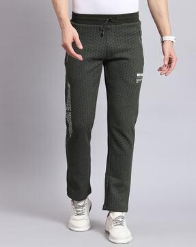 men geometric print track pants with insert pockets