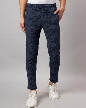 men geometric print track pants with insert pockets