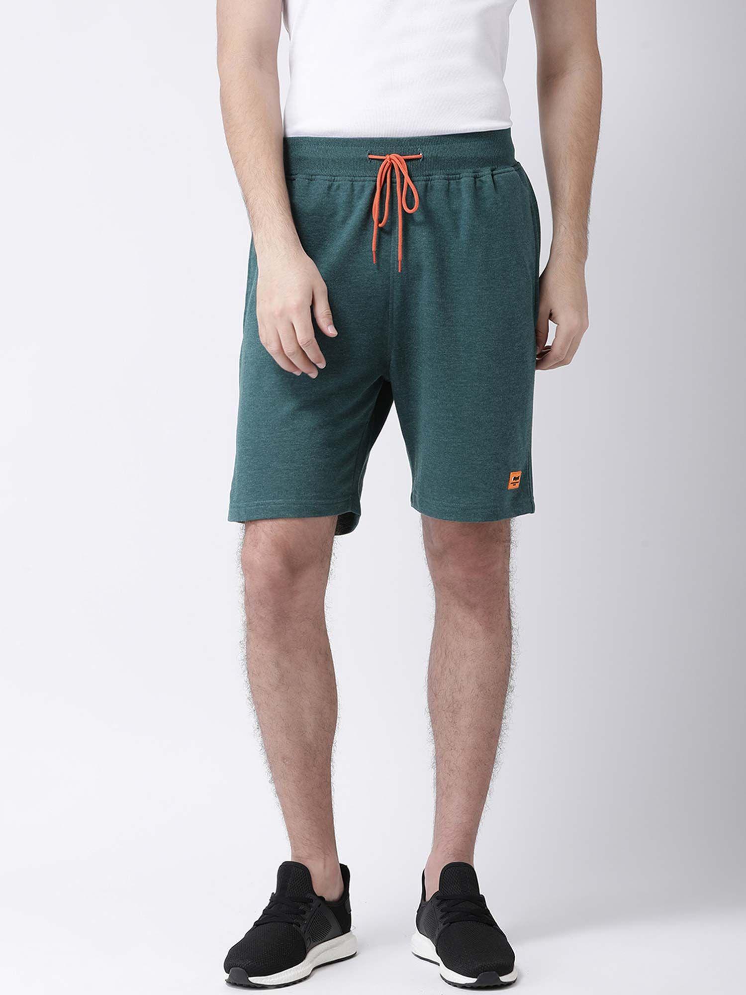 men green solid regular shorts