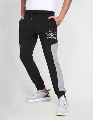 men grey elasticised waist panelled joggers