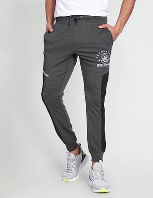 men grey elasticised waist panelled joggers