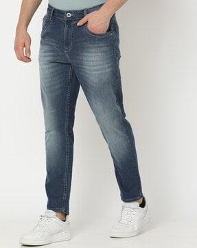 men heavily washed cropped fit jeans