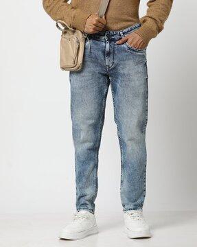 men heavily washed cropped fit jeans
