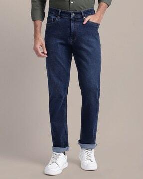 men heavily-washed relaxed fit jeans