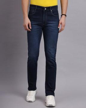 men heavily-washed relaxed fit jeans