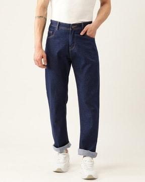 men heavily washed relaxed jeans