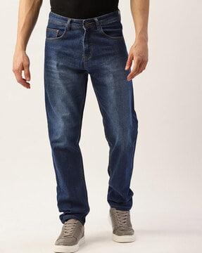 men heavily washed relaxed jeans