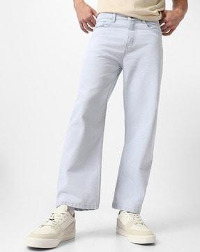 men heavily washed relaxed jeans