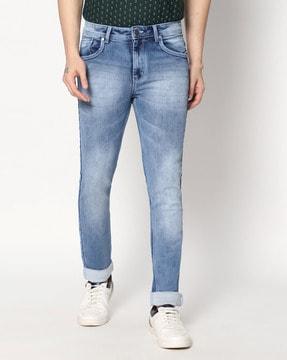 men heavily washed slim fit jeans