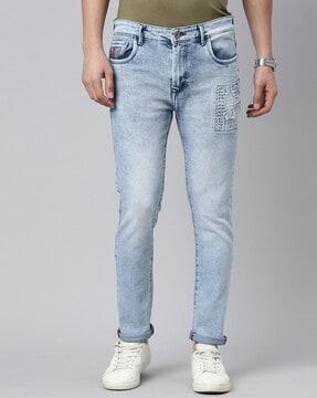 men heavily washed slim fit jeans