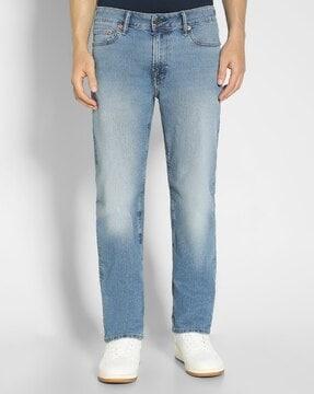 men heavily washed straight jeans