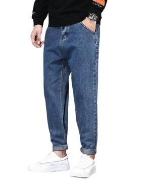 men high-rise tapered jeans