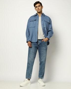 men lighlty washed loose fit jeans