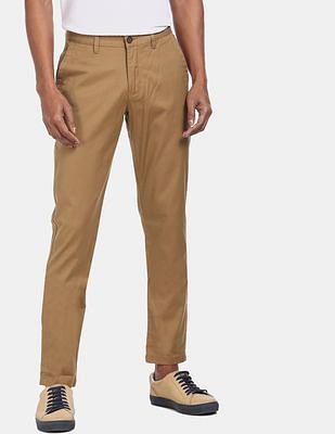 men light brown mid rise solid casual trousers